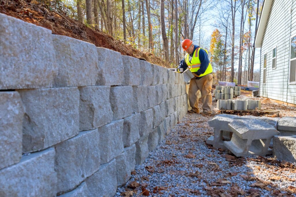 Concrete block retaining wall was mounted by a contractor