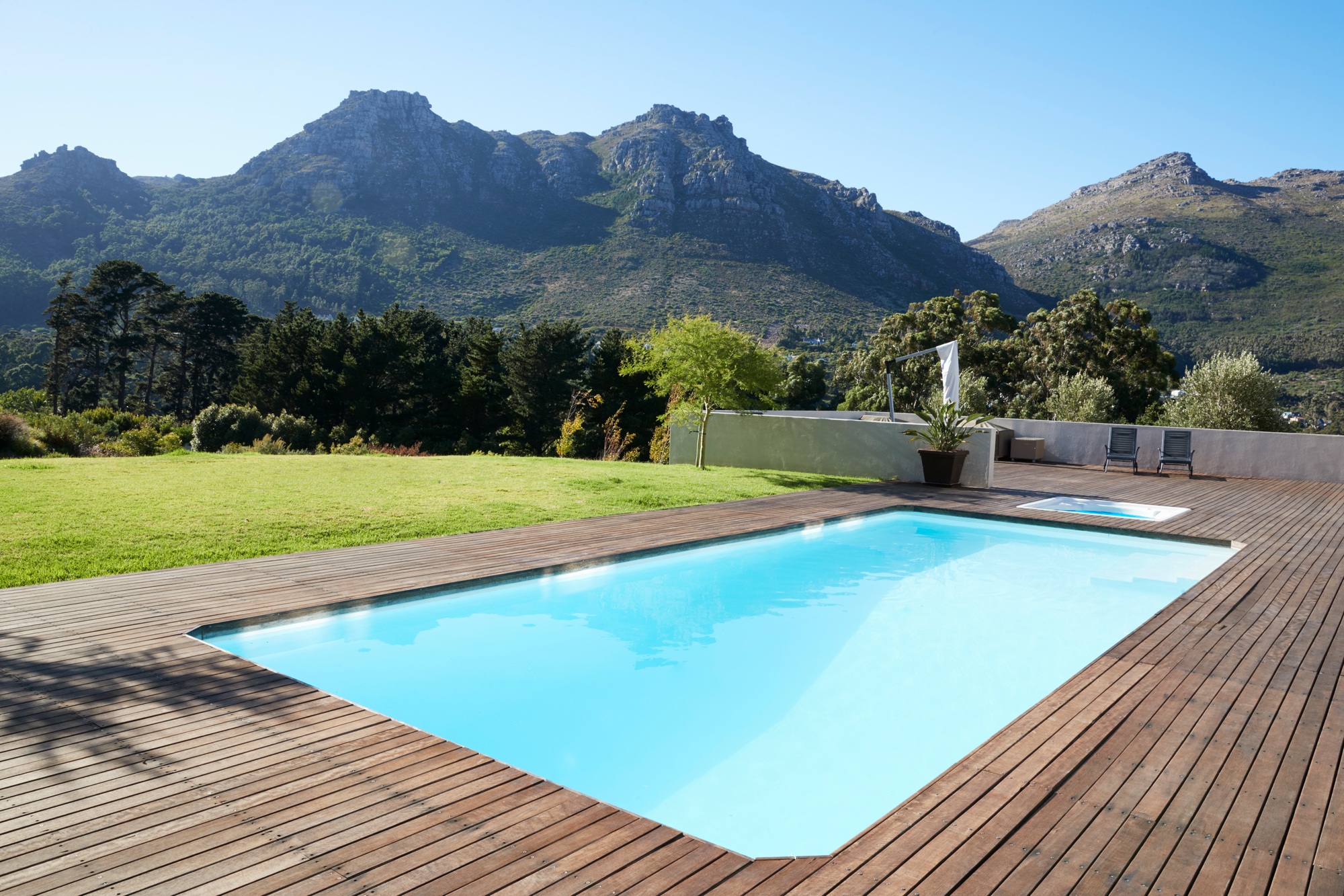 Outdoor Swimming Pool Surrounded With Wooden Decking