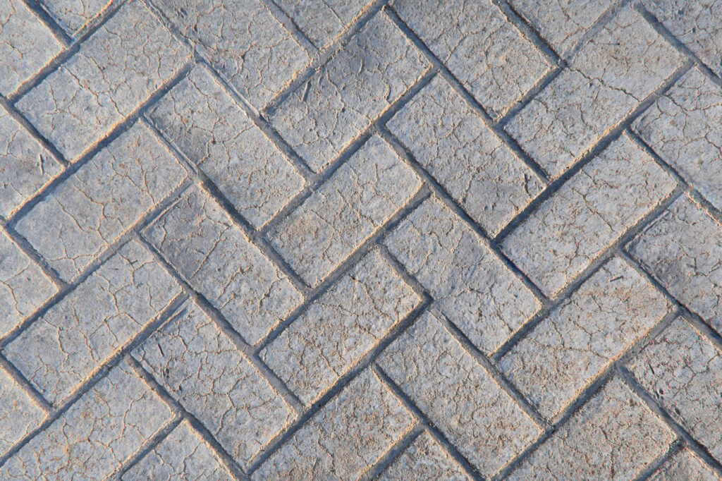 Stamped concrete floor texture background.